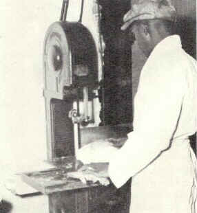 Cutting Cod Steaks; Photo from The Delaware County Advocate, July 1942